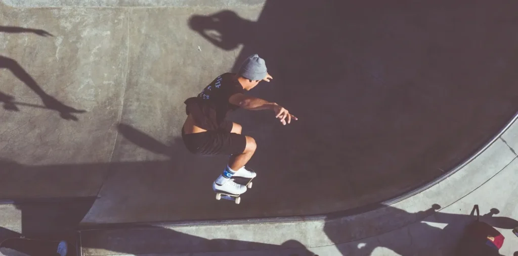 boy skateboarding in a skate park