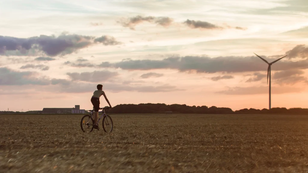 Person riding an ebike in the fields