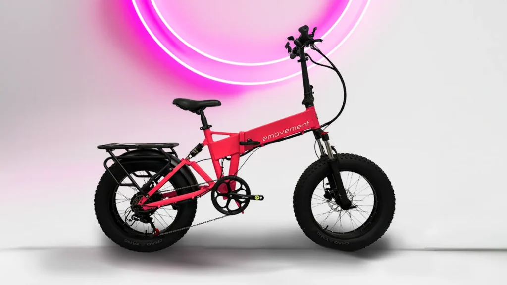 Panther in the colour babe is a hot pink fat tyre ebike with a rear rack and dual suspension