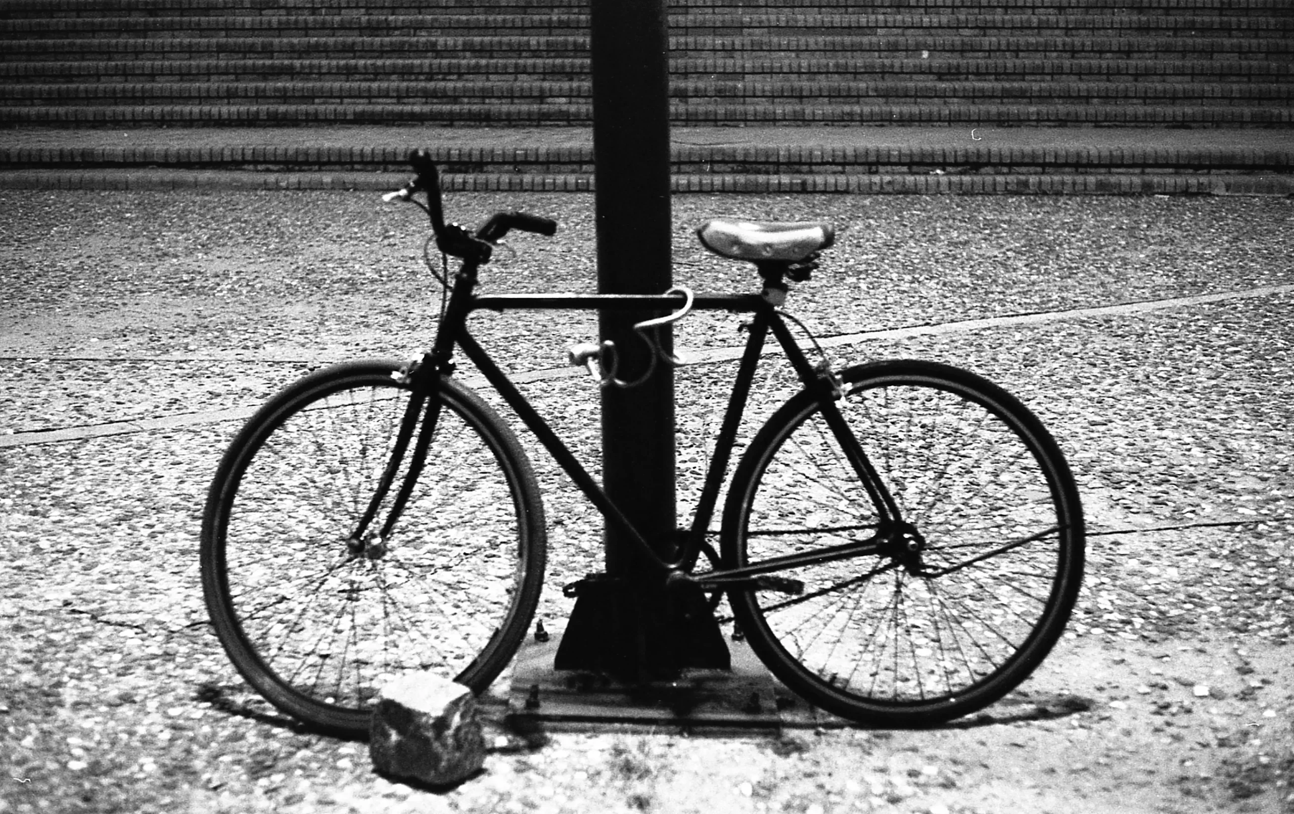 bike shackled to a lamppost